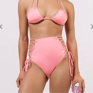 We are HAH Titsy top and HiKini bottom peachy pink NWT SZ Small